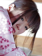 As Uri lifts up her Japanese Yukata, her silky white panties and wide hips are exposed. The thong is so thin it can't cover the creases of her booty hole.