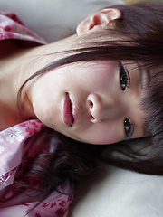 As Uri lifts up her Japanese Yukata, her silky white panties and wide hips are exposed. The thong is so thin it can't cover the creases of her booty hole.