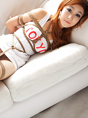 Yui Asian boytoy has big tits tied of hands and legs in ropes