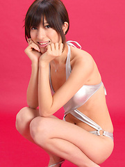 Mana Mizuno Asian in silver bath suit knows to pose irresistible