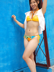 Shizuka Asian honey offers beautiful smile while posing outdoor