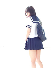 Minami looks like a pretty soldier manga girl waiting to join Sailor Moon. You know that anime? The team of schoolgirls who jump and flash their panties!