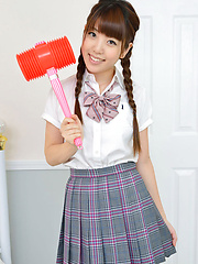 Mizuho Shiraishi Asian with uniform and pigtails plays like child