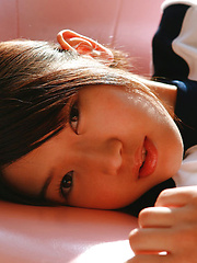 Noriko Kijima Asian in sports equipment is playful in the house