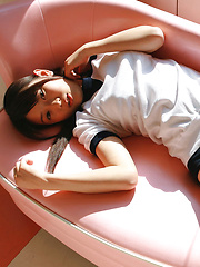 Noriko Kijima Asian in sports equipment is playful in the house