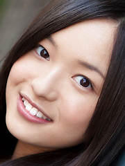 Mayumi Yamanaka Asian takes a walk in her city after classes